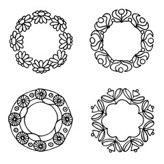 Set of hand-drawn round floral frames. Ink drawing.