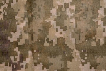 Texture of camouflage fabric as background, top view