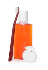 Mouthwash, toothbrush and dental floss isolated on white