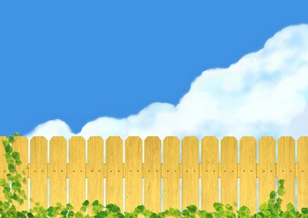 Obraz premium 黄色い木の柵と背景に広がる青空 A