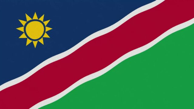 A waving flag of Namibia in 4K and 60 frames per second with artistic grain.