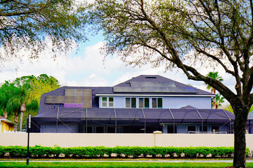 Solar panel on a house roof; Green energy from sun	
