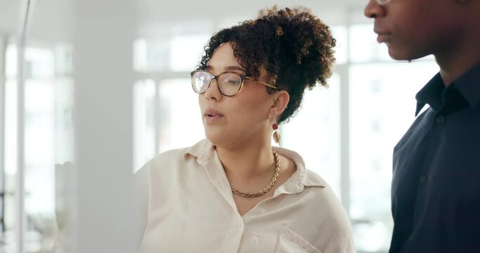 Business people, discussion or whiteboard for writing or brainstorming, mindmap or project management in office. Design team, diversity or planning with notes on wall, idea or solution in workplace