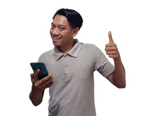 A portrait of an Asian man wearing a gray t-shirt with one hand facing forward in a rejecting motion, and the other hand holding a smartphone with a blank screen. Isolated with a white background.