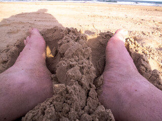 feet in the sand