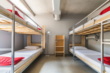 Showcasing a cozy hostel with neatly arranged dormitory beds and clean floorsStudio shot luxurious design elegant simplicity