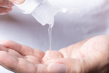 Alcohol washing hands with antibacterial sanitizer gel. hygiene concept. prevent the spread of...