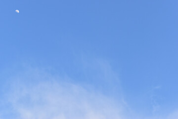 beautiful blue sky and white fluffy cloud with sunrise in the morning, natural background