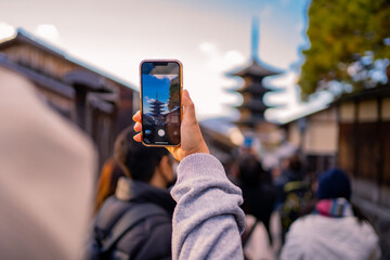 Yasaka Pagoda view and Hokan-ji Temple from Yasaka Dori street in Kyoto, Japan. Popular touristic...