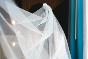The veil is one of the oldest parts of a bridal ensemble, served to hide the bride's face from the...