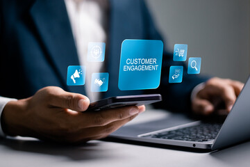 Customer engagement concept. Target customer, buyer persona and customer behavior. Businessman using laptop with customer engagement icon on virtual screen.