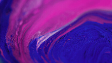Paint blend. Ink wave. Defocused vivid pink blue color glitter texture acrylic dye mix flow motion...