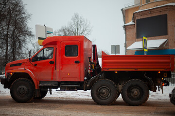 Truck in the city. Construction vehicles. Trucking on the highway.