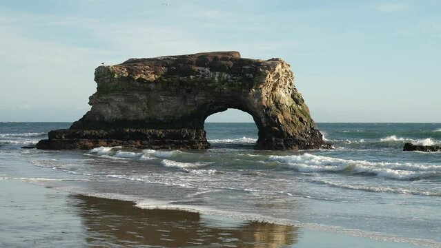Rock arch on the beach in Bodega Bay, CA, 4K