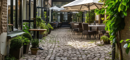 Peaceful Outdoor Cafe on Cobblestone Pathway with Greenery
