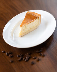 A piece of delicious cheesecake on a plate.