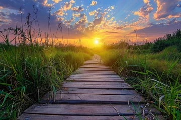 Ingelijste posters Beautiful sunset with a wooden walkway © Adeel  Hayat Khan