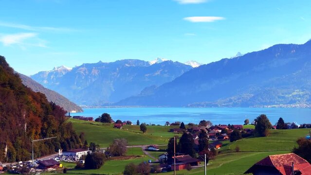 Switzerland railway train bahnhof travel Swiss Alps landscape Thunersee lake blue sky stunning morning Bern Thun Interlaken Thunersee Zurich Saas Fee Seestrasse Zermatt summer autumn fall Jungfrau