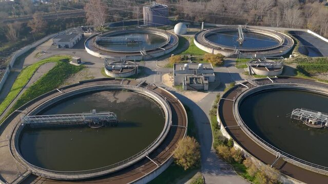 Aerial establishing shot of a large water purification plan in Avignon
