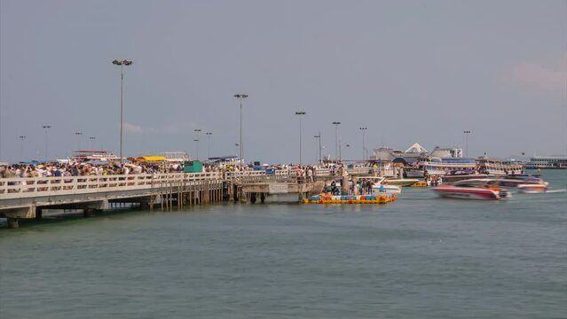 Bali High pier in Pattaya, Chon Bori, boats and tourists Timelapse, hyperlapse, Thailand, Bang Lamung