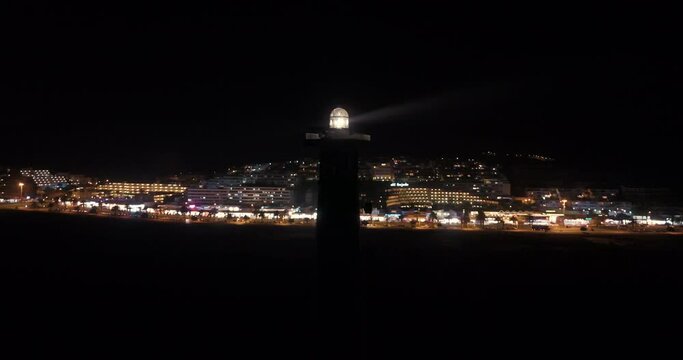 Jandia lighthouse at night aerial drone shot standing still