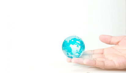 Globe ,earth in human hand, holding. Earth image provided by Nasa - 755338693