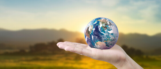 Globe ,earth in human hand, holding. Earth image provided by Nasa