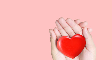 Hands holding  red heart. heart health donation - 755340062