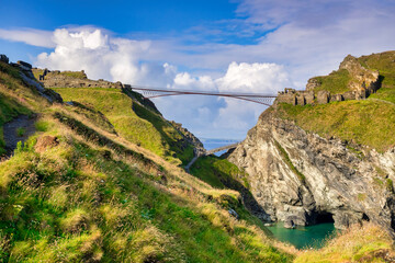 Tintagel Castle, Cornwall, UK, and its famous double cantilever bridge. It is the legendary...
