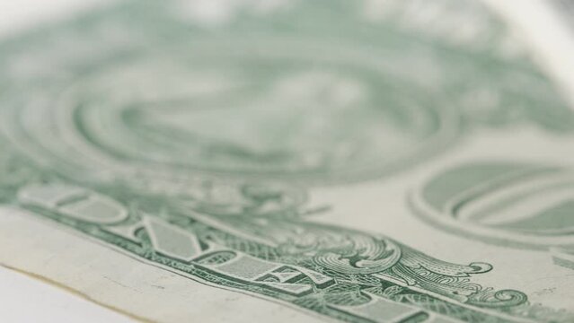 Close Up Shot Of Folded American Dollar Bill Rotating Slowly. Macro Shot