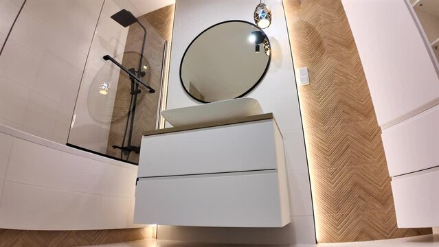 Luxury Modern White Marble Bathroom Interior With Roun Mirror.