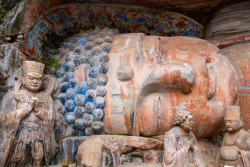 Rock sculpture of the 31m sleeping buddha statue of sakyamuni entering nirvana