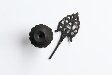 Kohl eyeliner, old make up tool used as eye liner, in an ancient metal package, contain black powder, flat lay or top view