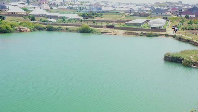 Natural Dam In The Countryside Near Jos, Nigeria - Aerial Parallax