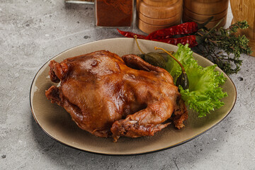 Baked small chicken with spices