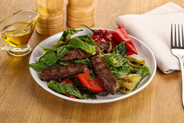 Salad with grilled beef steak