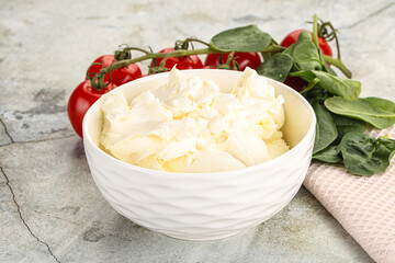 Soft cream cheese in the bowl