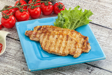Grilled pork steak with ketchup