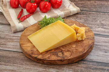 Parmesan hard cheese with small pieces