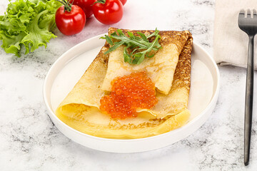 Russian pancake with red caviar