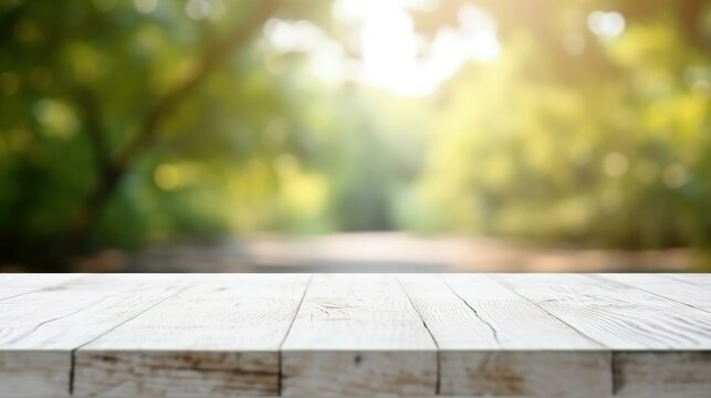 Wood table top on blur green nature background with bokeh light