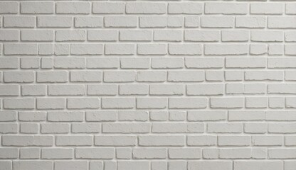 A white brick wall with no other objects in the background