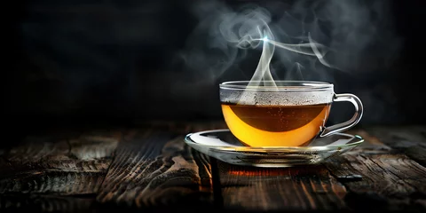 Foto op Plexiglas cup of tea on a black background © Maizal
