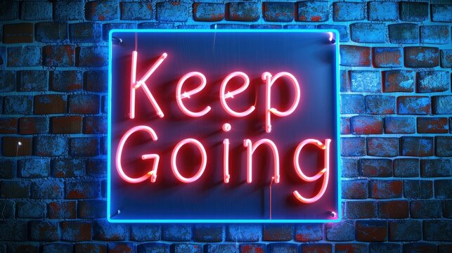 Keep Going in neon lettering, mounted on a rustic brick wall background, serving as a constant reminder of perseverance and determination