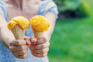 Refreshing ice cream in waffle cones with lemon flavour - 755401227