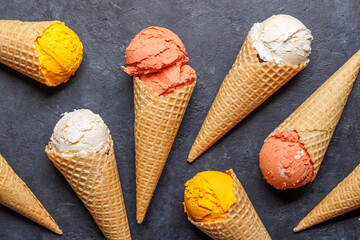 Assorted ice cream flavours in delightful waffle cones - 755401695