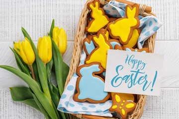 Easter Bunny-Shaped Gingerbread Cookies, Yellow Tulips, and Greeting card