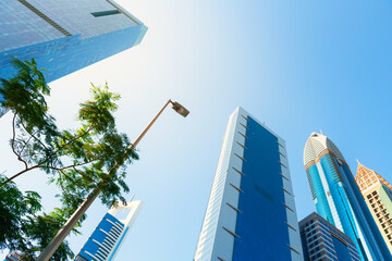 Dubai downtown with modern skyscrapers at sunny day. Dubai, United Arab Emirates.