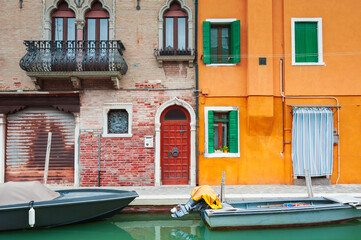 Colorful architecture on the canal in Burano island, Venice, Italy.