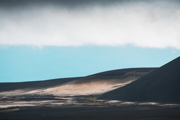 Fototapeta na wymiar Black lava fields near Tolbachik volcano in Kamchatka peninsula, Russia.